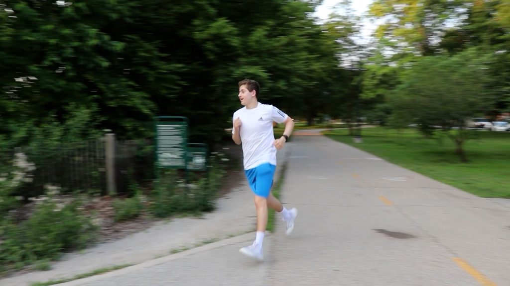 A person runs on a path.