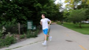 A person runs on a path.